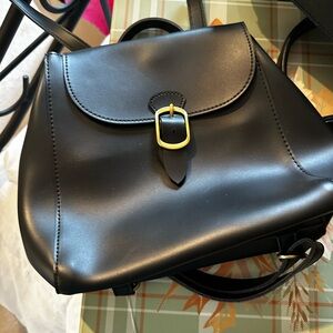 Minimal Black Leather Backpack with Gold Buckle Accent